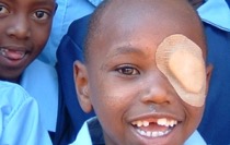Boy with bandage over eye