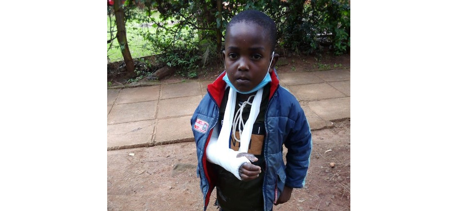 Boy with arm in sling